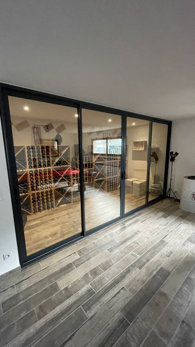 Création d'une cave vitrée avec baie coulissante alu à La Teste de Buch