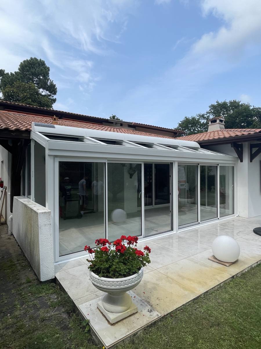 Fermer sa terrasse pour création d'une véranda à Arcachon